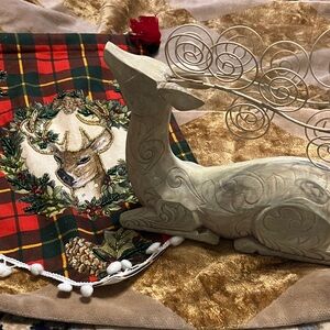Rustic Plaid Holiday Banner with Deer Wreath and Small Deer Statue.